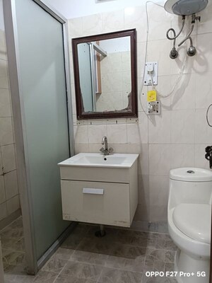 Bathroom in 3 BHK Apartment at Sector 6 Dwarka – for Rent