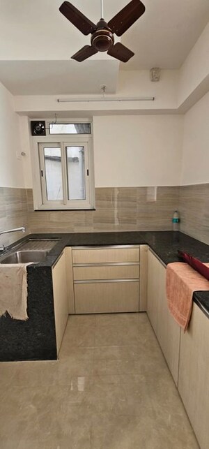 Kitchen in 1 BHK Apartment at Puranik Aarambh, Ghodbunder Road – for Rent