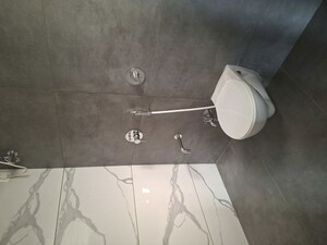 Bathroom in 2 BHK Apartment at Raunak Unnathi Greens, Kasarvadavali – for Rent