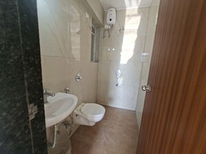 Bathroom in 1 BHK Apartment at Kavya Hill View CHS, Anand Nagar – for Rent