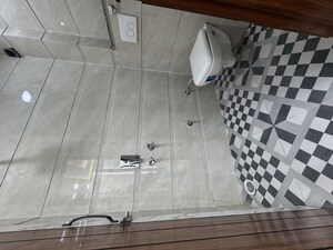 Bathroom in 2 BHK Builder Floor at Dwarka Mor – for Sale