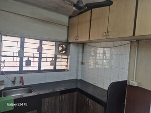 Kitchen in 2 BHK Apartment at Aditi CHS, Aundh – for Rent