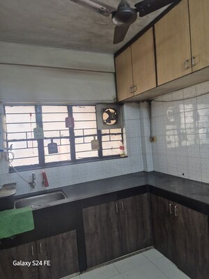 Kitchen in 2 BHK Apartment at Aditi CHS, Aundh – for Rent