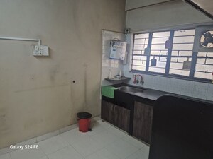 Kitchen in 2 BHK Apartment at Aditi CHS, Aundh – for Rent