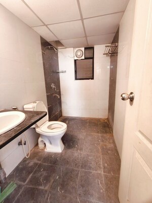 Bathroom in 2 BHK Apartment at Kolte Patil Margosa Heights, Mohammadwadi – for Sale