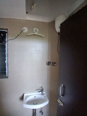 Bathroom in 1 BHK Apartment at Group Satellite Aarambh, Malad East – for Rent