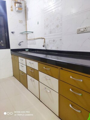Kitchen in 1 BHK Apartment at Vasant Oscar, Mulund West – for Sale