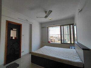 Bedroom in 3 BHK Apartment at The Wadhwa Anmol Fortune, Goregaon West – for Rent