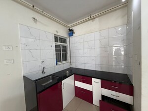 Kitchen in 1 BHK Apartment at Kolte Patil Life Republic 16th Avenue Arezo, Hinjewadi – for Rent