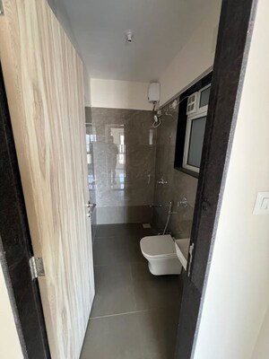 Bathroom in 1 BHK Apartment at Mahaveer Solitaire Edge, Kandivali East – for Rent