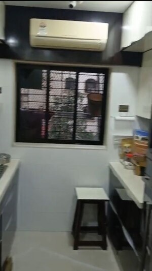Kitchen in 2 BHK Apartment at Rajkamal Apartment Andheri, Andheri West – for Rent