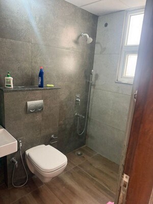 Bathroom in 3 BHK Apartment at Affinity Greens, International Airport Road – for Rent