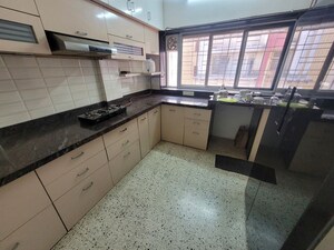 Kitchen in 3 BHK Apartment at Rajas Garden Apartment, Shivajinagar – for Rent
