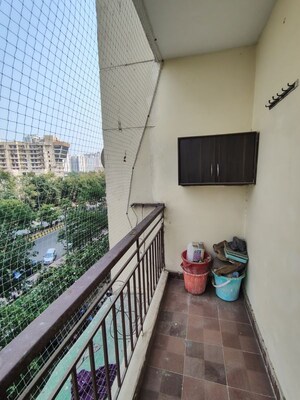 Balcony in 2.5 BHK Apartment at Aims Golf City, Sector 75 – for Rent