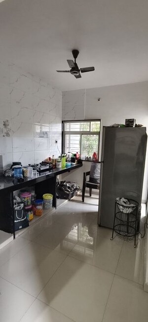 Kitchen in 1 BHK Apartment at Kamgar Putala Vasahat – for Sale