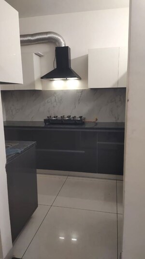 Kitchen in 3 BHK Apartment at Affinity Greens, International Airport Road – for Rent