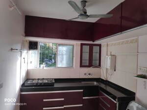 Kitchen in 2 BHK Apartment at Sai Dham CHS, Dhanori – for Rent