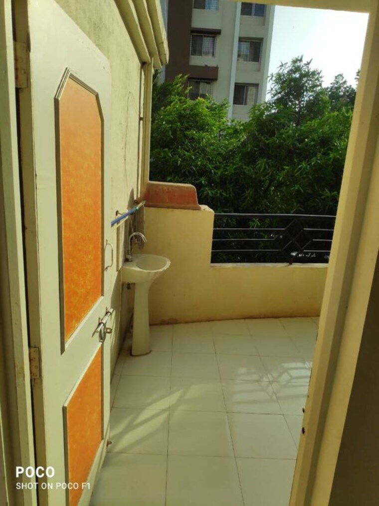 Balcony, sai-dham-chs 2 Bedroom 750 Sq.Ft. Apartment In Dhanori Pune 10350881