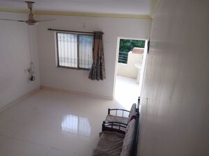 Living Room in 2 BHK Apartment at Sai Dham CHS, Dhanori – for Rent