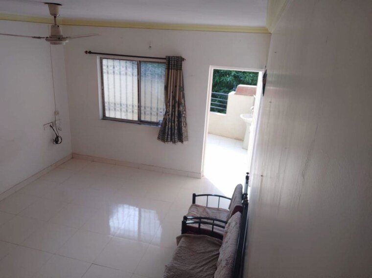 Living Room, sai-dham-chs 2 Bedroom 750 Sq.Ft. Apartment In Dhanori Pune 10350881
