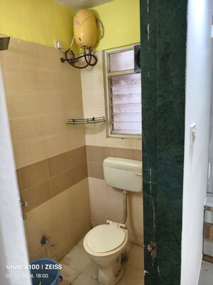 Bathroom in 2 BHK Apartment at Anand Green Crest, Hadapsar – for Rent