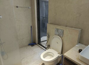 Bathroom in 2 BHK Apartment at Omkar Vive, Kurla – for Rent