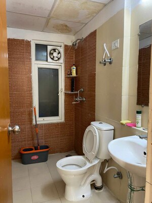 Bathroom in 2 BHK Apartment at Mahagun Mywoods II, Sector 16c Greater Noida – for Rent