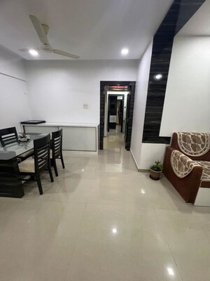 Living Room in 2 BHK Apartment at Raunak Sai Dham Towers, Kandivali West – for Sale