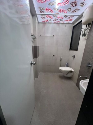 Bathroom in 2 BHK Apartment at Raunak Sai Dham Towers, Kandivali West – for Sale