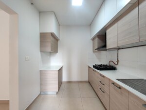 Kitchen in 2.5 BHK Apartment at Bhartiya Nikoo Homes Phase 2, Thanisandra Main Road – for Rent