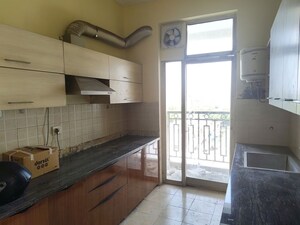 Kitchen in 3.5 BHK Apartment at Amrit Avenue, Sushant Golf City – for Rent