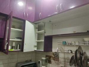 Kitchen in 2 BHK Apartment at Gaur 14th Avenue High Street, Sector 16c Greater Noida – for Rent