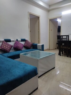 Living Room in 2 BHK Apartment at Gaur 14th Avenue High Street, Sector 16c Greater Noida – for Rent