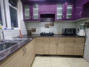 Kitchen in 2 BHK Apartment at Gaur 14th Avenue High Street, Sector 16c Greater Noida – for Rent