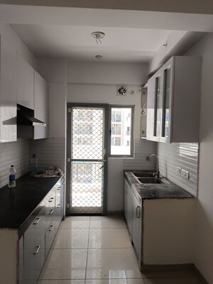 Kitchen in 2.5 BHK Apartment at Gulshan Bellina, Sector 16 Greater Noida – for Rent