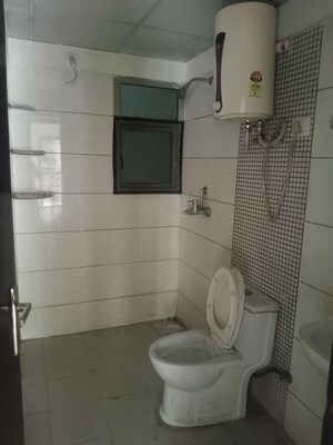 Bathroom in 2.5 BHK Apartment at Gulshan Bellina, Sector 16 Greater Noida – for Rent