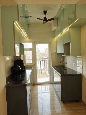 Kitchen in 4 BHK Apartment at T Homes Phase 1, Siddharth Vihar – for Rent