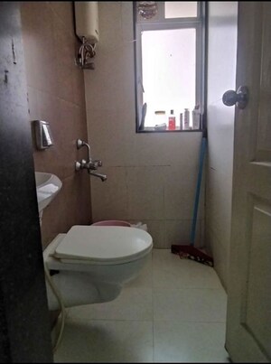 Bathroom in 1 BHK Apartment at JP Unity Tower, Lower Parel – for Rent