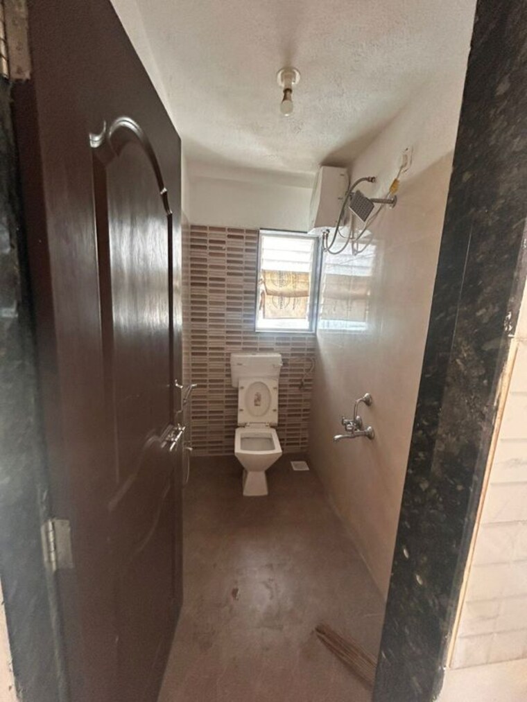Bathroom, kamgar putala vasahat 1 Bedroom 550 Sq.Ft. Apartment In Kamgar Putala Vasahat Pune 10351583