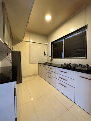 Kitchen in 2 BHK Apartment at Atur Park, Koregaon – for Rent