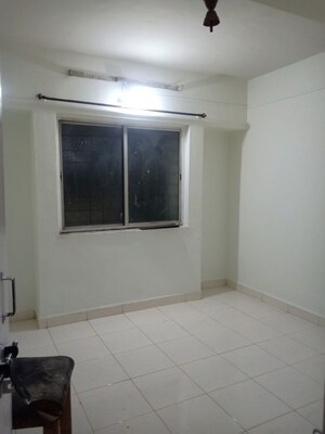 Room in 2 BHK Apartment at Runwal The Central Park, Chinchwad – for Rent