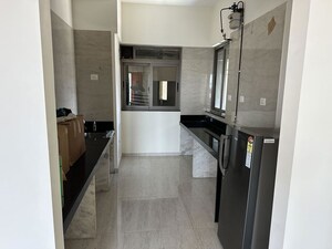 Kitchen in 3 BHK Apartment at Sheth Auris Serenity Tower 1, Malad West – for Sale