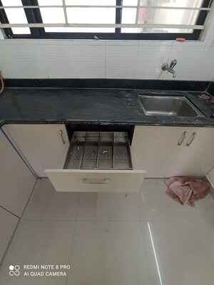 Kitchen in 3 BHK Apartment at Associated Sai Smruti, Dahanukar Colony – for Rent