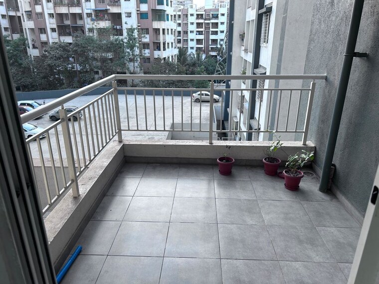 Balcony, pristine-greens 2 Bedroom 690 Sq.Ft. Apartment In Moshi Pune 10351793