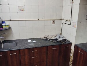 Kitchen in 2 BHK Apartment at Lok Terraces, Vashi Sector 17 – for Rent