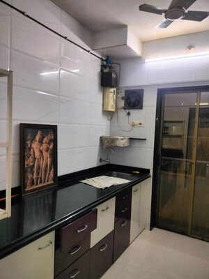 Kitchen in 1 BHK Apartment at Dedhia Elita, Ghodbunder Road – for Rent
