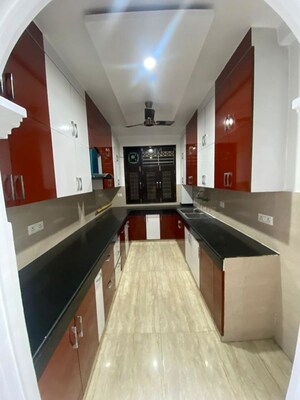 Kitchen in 2 BHK Apartment at Amrapali Hanging Gardens, Sector 107 – for Rent