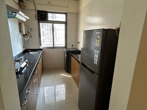 Kitchen in 2 BHK Apartment at Sheth Vasant Athena, Laxmi Nagar – for Rent
