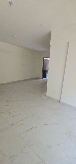 Living Room in 2 BHK Apartment at Usha CHS, Kopri – for Rent