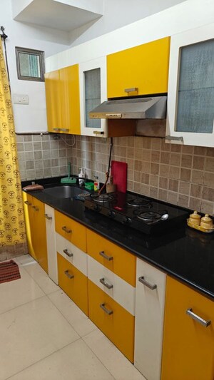 Kitchen in 3 BHK Apartment at Kalpavriksha Apartment, Vasant Vihar – for Rent